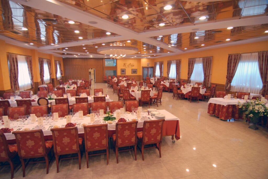 Second banquet hall with panelled ceiling, set for a large event