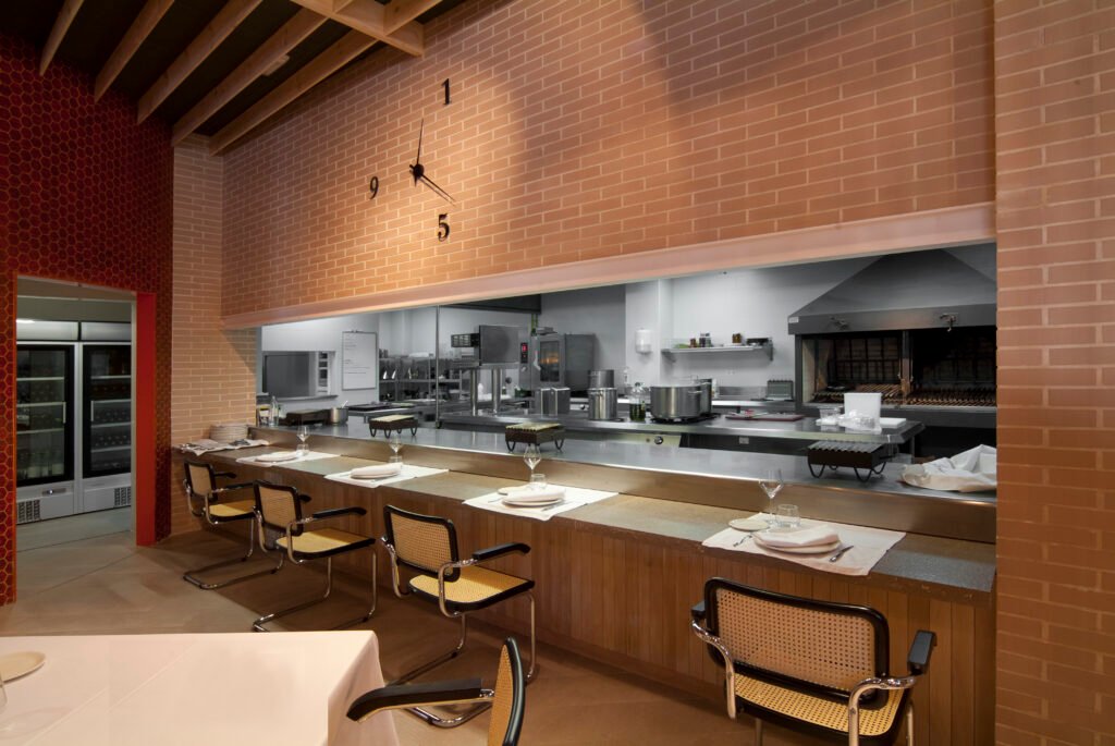 Asador restaurant with open kitchen and wood-fired grill